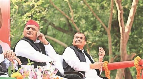 Mainpuri Bypoll Campaign Akhilesh Yadav Touches Shivpals Feet As They