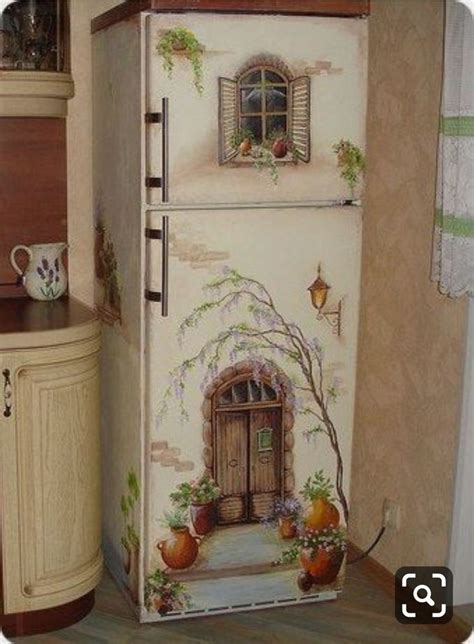 An Old Fashioned Refrigerator Painted With Flowers And Potted Plants