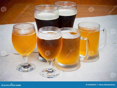 Beer Glasses On Table Stock Image Image Of Yellow Foam 82868281