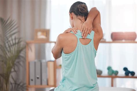 Woman With Chiropractor Physiotherapy And A Spine Massage Back Pain