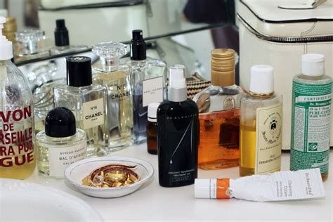 The Counter Is Full Of Different Types Of Perfumes And Personal Care