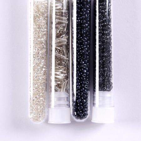 4 tubes de perles de rocaille tons noirs et argentés Créalia Perles