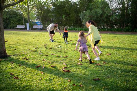 Children Playing on Green Grass Field · Free Stock Photo