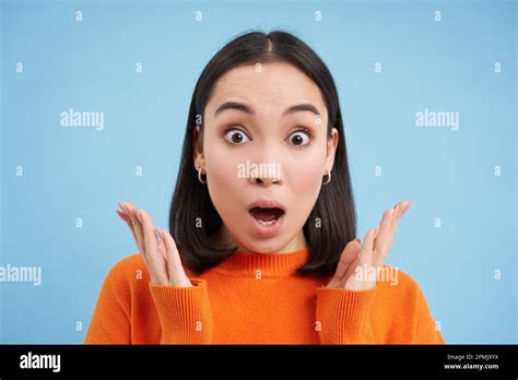 Close Up Portrait Of Amazed Brunette Girl Says WOW Amazed By Smth Asian Woman Looks Surpirsed