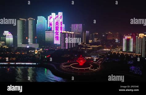 Night Illumination Qingdao City Famous Bay Monument Aerial Panorama 4k