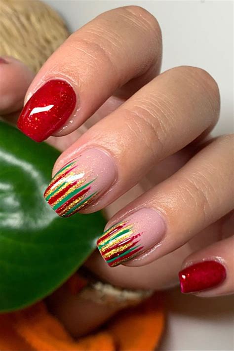 50 Festive Holiday Nail Designs And Ideas Red Candy Cane Tip Nails