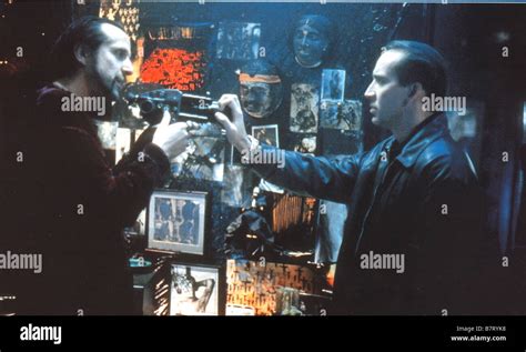 Nicolas cage 8mm hi-res stock photography and images - Alamy