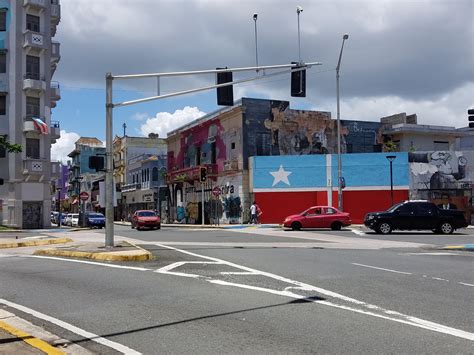 Revolutionary flag of Puerto Rico (flag of Lares) next to the ...