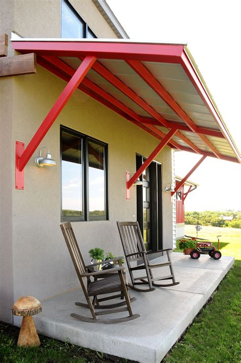 Front entry with concrete slab with steel awning and braces. | Front ...