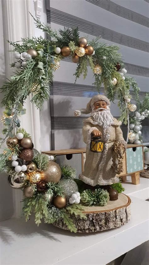 A Christmas Decoration Is Displayed On A Shelf In Front Of A Window