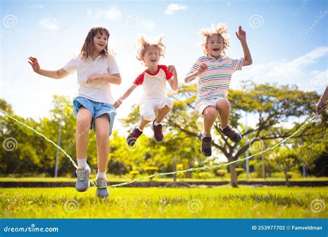 Happy Kids Play Outdoor Children Skipping Rope Stock Photo Image Of