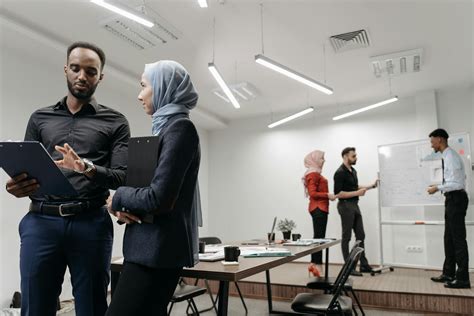 Colleagues Speaking in Meeting in OfficeFree Stock Photo
