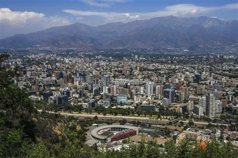 Aerial View Of A City And The Andes Mountain In The Background