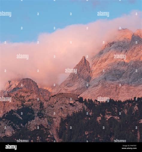 Sunset in the alps Stock Photo - Alamy