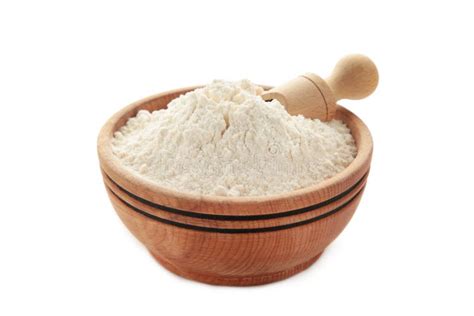 Wooden Bowl With Flour And Flour Spoon Rice Or Wheat Flour Isolated On