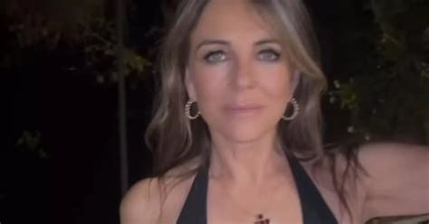 Liz Hurley 58 Leaves Fans Sweating As She Ditches Bra And Struts In Plunging Jumpsuit Daily Star