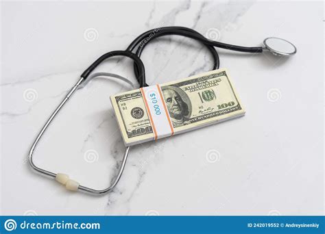 Healthcare Insurance And Economy Concept American Hundred Dollar