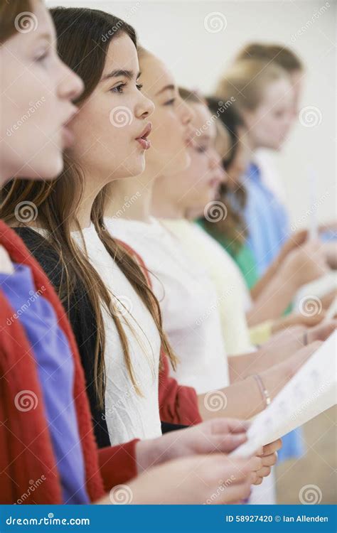 Group Of School Children Singing In Choir Together Stock Photo Image