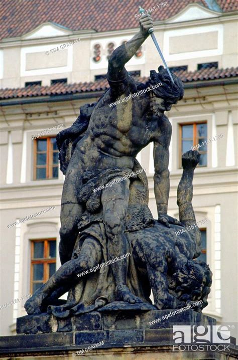 Statue Above The Main Entrance Gate Of Hradcany Castle Prague Stock