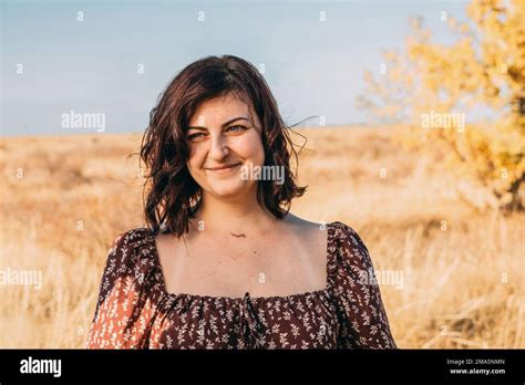 Portrait Of A Beautiful Year Old Woman Smiling In The Park Stock