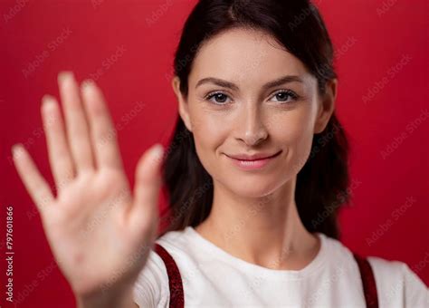 Woman Shows Her Palm To The Camera To Stop Being People Pleaser