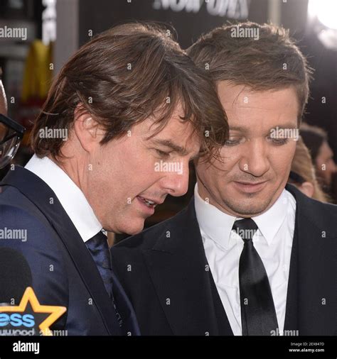 L R Actor Tom Cruise And Jeremy Renner Attend The Mission Impossible