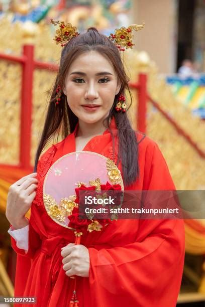 Asian Girl Wearing Chinese Costumes Decoration For Chinese New Year Festival Celebrate Culture