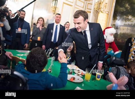 French President Emmanuel Macron and his wife Brigitte attend the ...