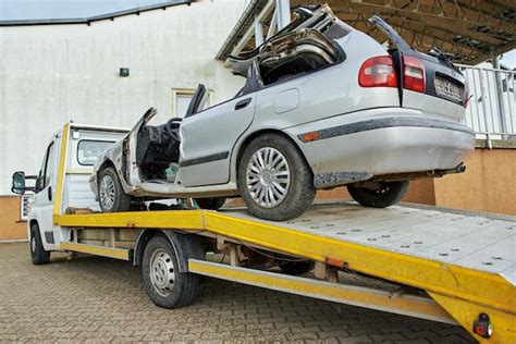 Premium Photo Crashed Car Loading Into Tow Truck After Traffic