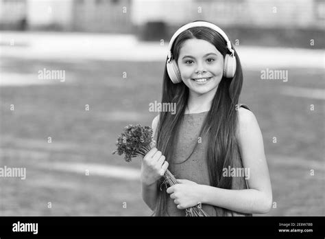 Summer music festival. Happy child listen to music outdoors. Little ...