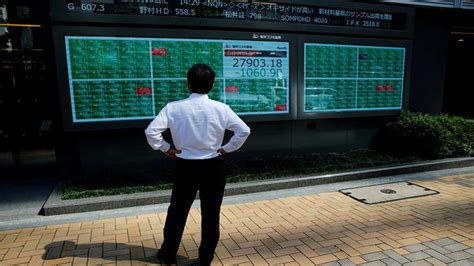 Asian Stocks Follow Wall St Lower After Fed Meet Signals Possible Rate Hike To Cool Inflation