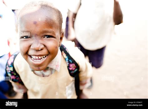 African school child smiling at camera Stock Photo - Alamy