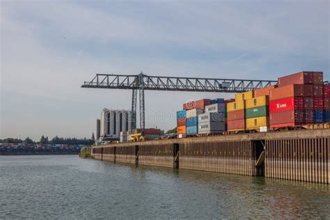 Cranes Containers And Cargo Around The Rhine River In The Industrial