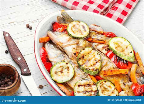 Grilled Fish With Vegetable Stock Photo Image Of Dish Baking