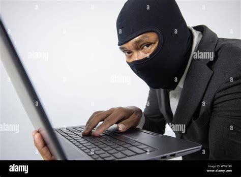 Concentrated Trained Masked Computer Hacker At Stealing Data From