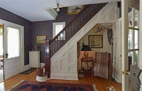 The Stairs In This House Are Made Of Wood And Have Been Painted Blue