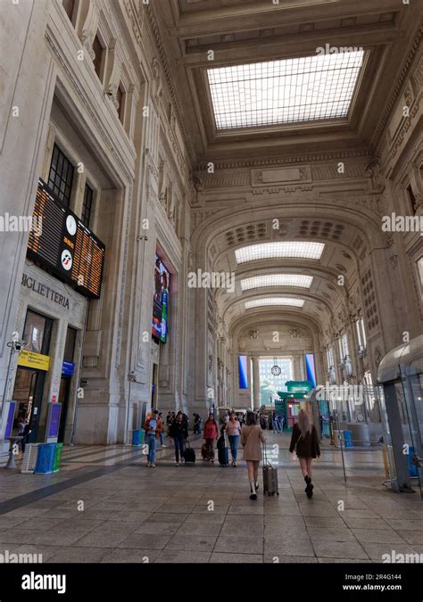 Interior Of Milan Centrale Railway Station Travellers Wheel Their