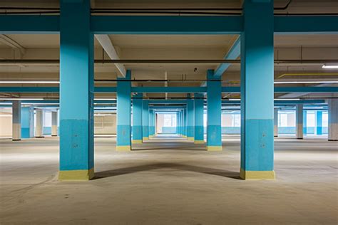 An Empty Parking Garage With Two Cars Background Domestic No People