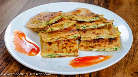 Egg Paratha Omelette Stuffed Flatbread The Delicious Crescent