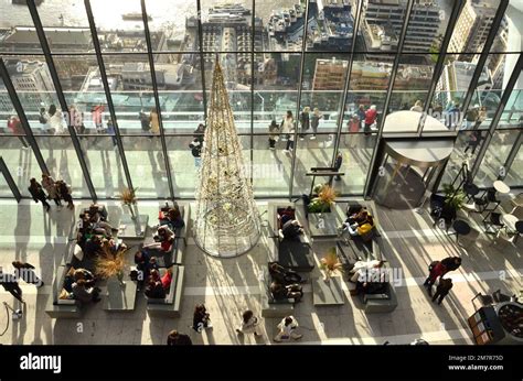 Visitors In The Sky Garden Cafe Overlooking The River Thames On The