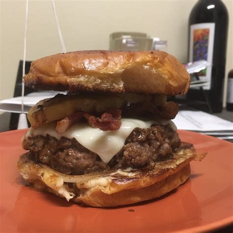 Homemade Burger With Swiss Bacon Pineapple Slices Grilled Onions