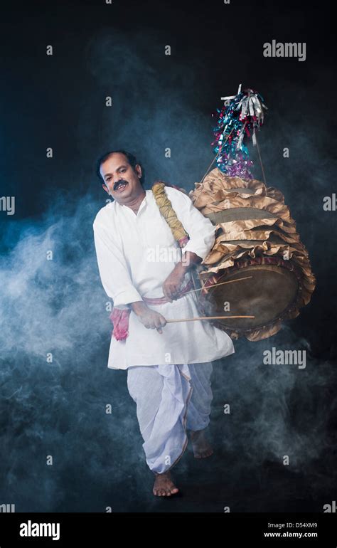 Man Playing Musical Instrument Dhol Hi Res Stock Photography And Images