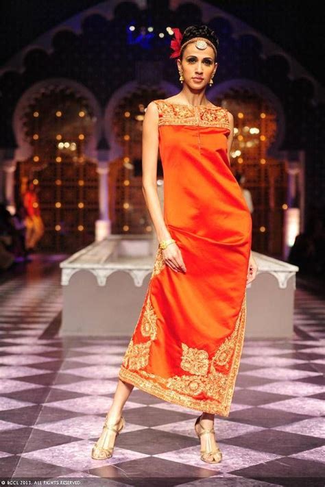 Alecia Raut Displays A Creation By Designer Raghavendra Rathore On Day