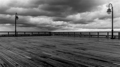 North Beach Pier with Clouds Photograph by Joseph Smith - Fine Art America