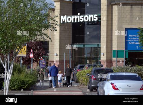 family shopping outside Morrisons supermarket store Anniesland Glasgow ...