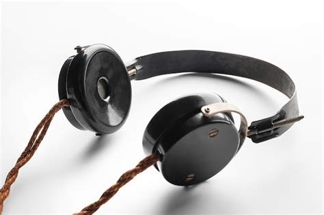 Os Fones De Ouvido Tradicionais - Fones de ouvido antigos fones de ouvido vintage para rádio em um fundo ...