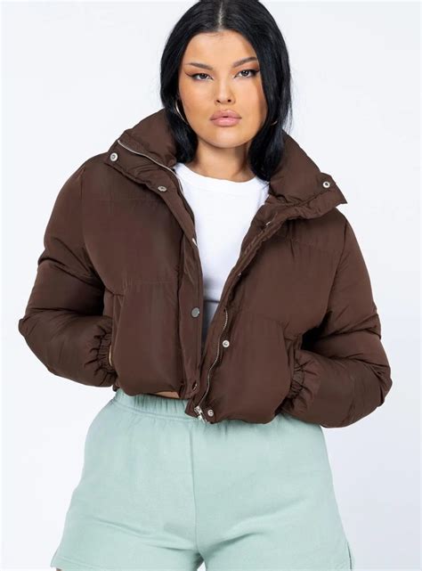 The 15 Best Brown Puffer Jackets For Women To Wear This Winter