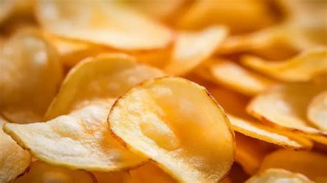 A Closer Look At The Textured Surface Of Crispy Fried Potato Chips