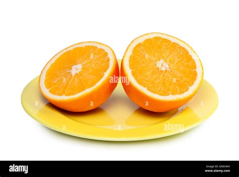 Cut Orange On Plate Stock Photo Alamy