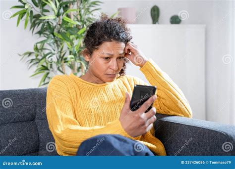 Sad Black Woman Reading Bad News On Smart Phone Stock Photo Image Of